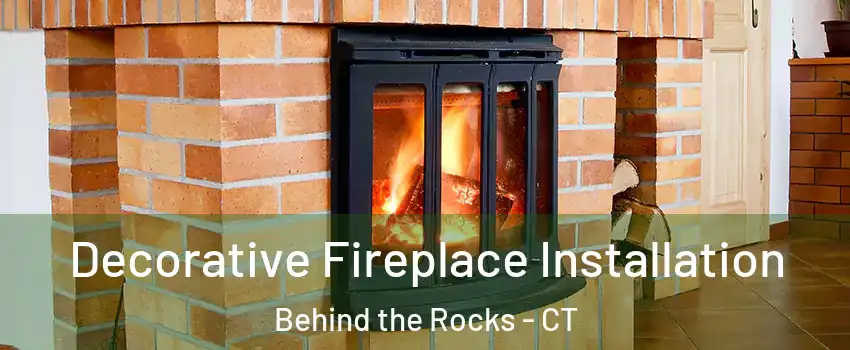 Decorative Fireplace Installation Behind the Rocks - CT