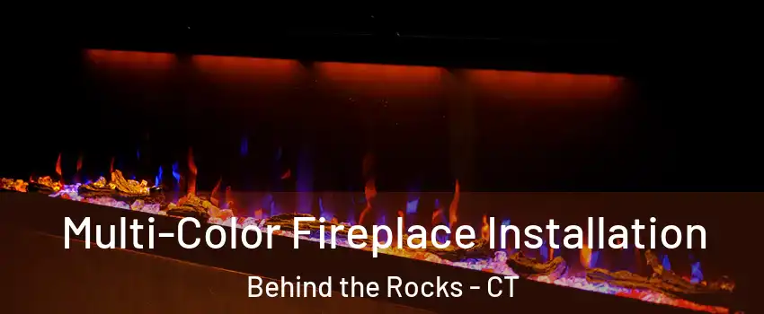 Multi-Color Fireplace Installation Behind the Rocks - CT